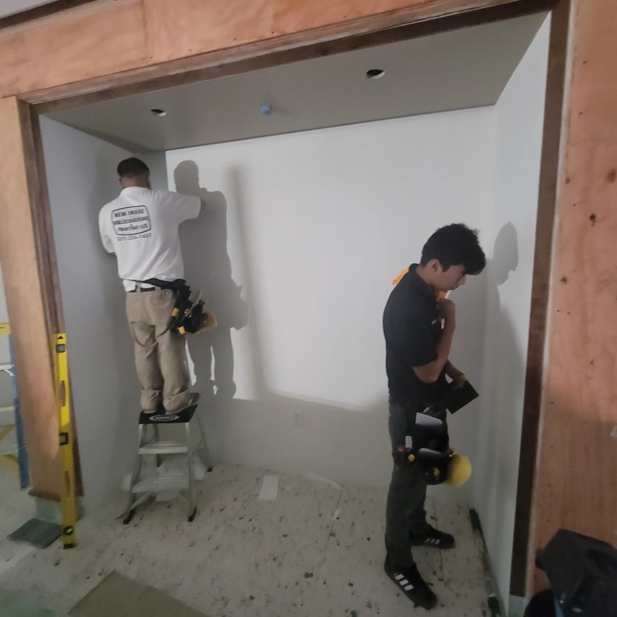 Peel Stick Wallpaper Installation team at work in Detroit